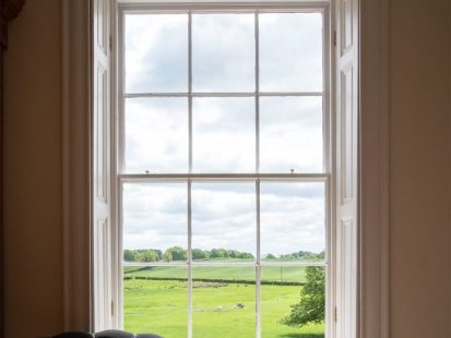 open window looking into the distance.